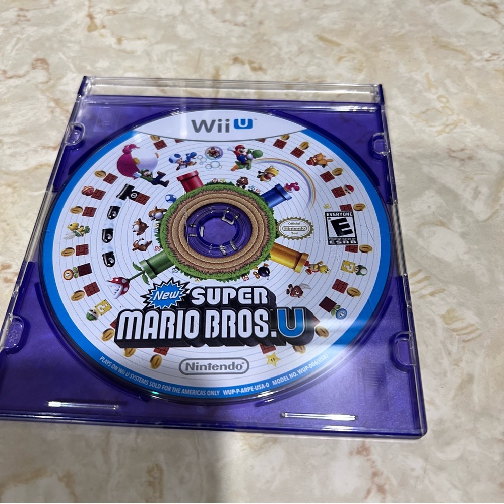 New Super Mario Bros. U Wii U game disc #Nintendo #WiiU